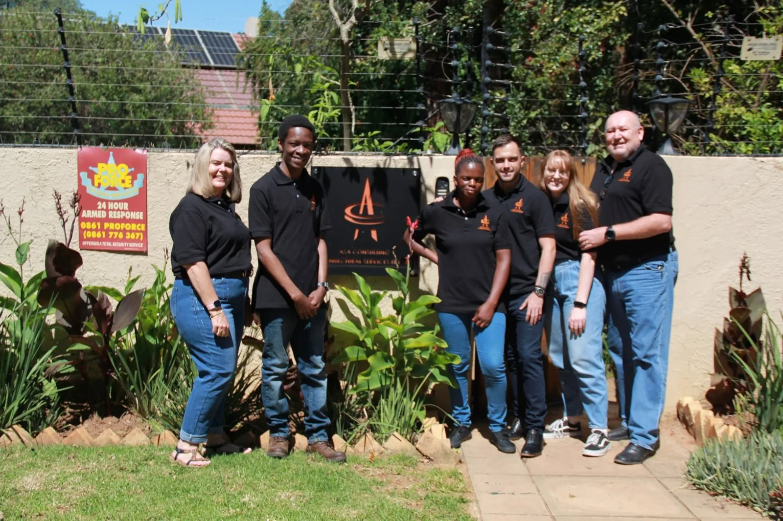 The ASA team standing together outside the practice